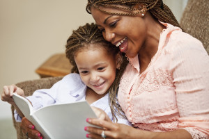 Mother and child reading a book